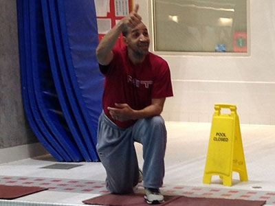 Larry Anderson thumbs up at pool