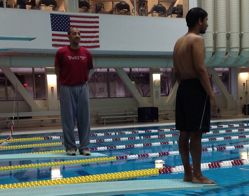 Larry Anderson at pool coaching student